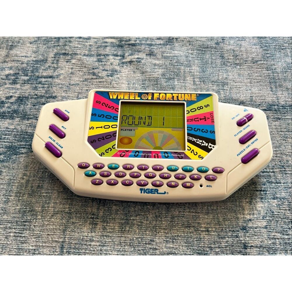Vintage Tiger Electronics Handheld Wheel of Fortune Game - Picture 3 of 3